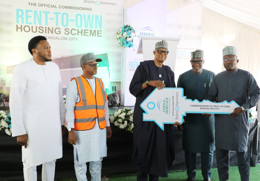 FMBN Presents Symbolic Keys to Beneficiaries of Brains and Hammers Bungalow City