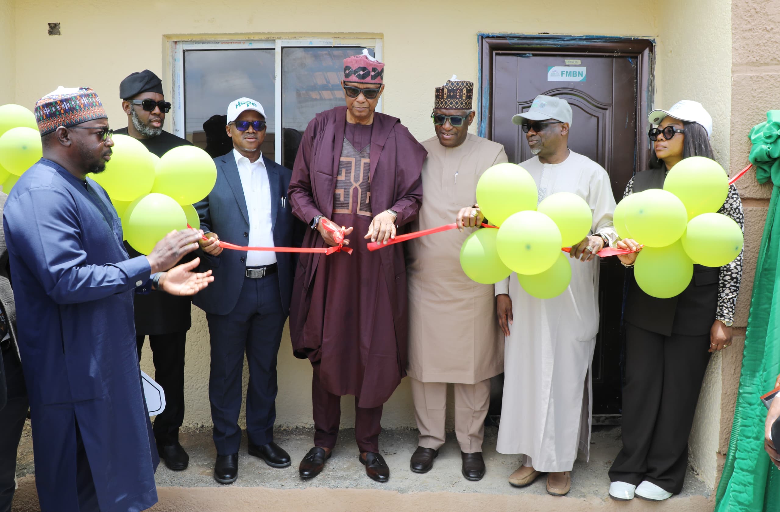 Housing Minister Presents House Keys to 129 NHF Beneficiaries at Nasarawa Technology Village